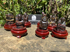 Hand Made Banded Tiger Iron Jasper - Far Eastern Gods on Wooden Stands In A Set of 7 - From Australia