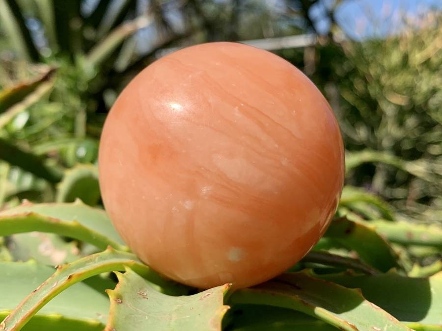 Polished Orange Twist Calcite Sphere x 1 From Madagascar