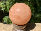 Polished Orange Twist Calcite Sphere x 1 From Madagascar