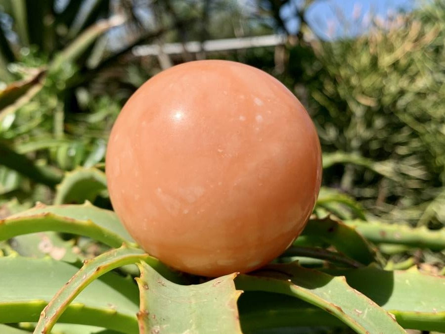 Polished Orange Twist Calcite Sphere x 1 From Madagascar