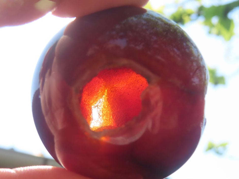 Polished Double Vug Carnelian Agate Sphere x 1 From Madagascar