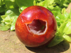 Polished Double Vug Carnelian Agate Sphere x 1 From Madagascar