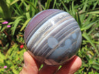 Polished Red, Grey and White Sardonyx Agate Sphere x 1 From Shashe River, Zimbabwe