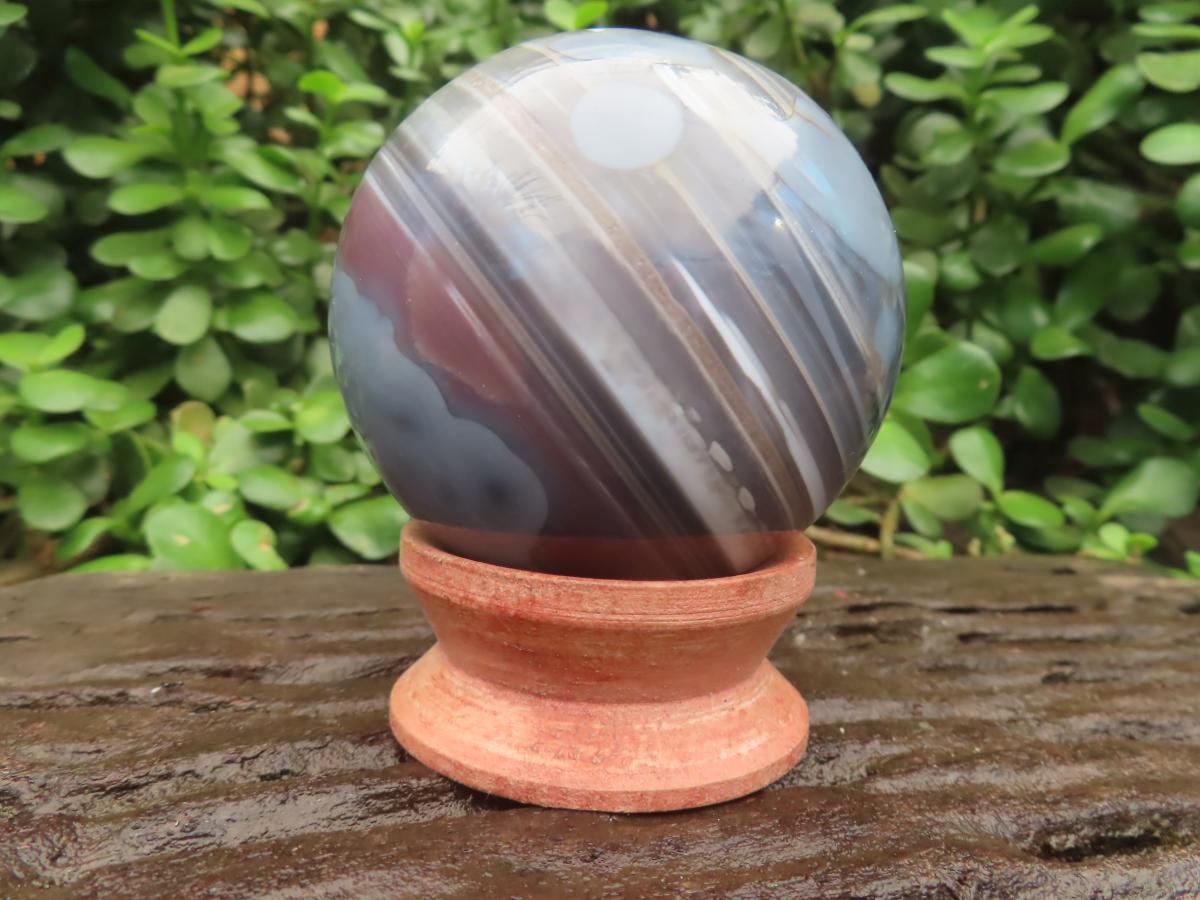 Polished Red, Grey and White Sardonyx Agate Sphere x 1 From Shashe River, Zimbabwe