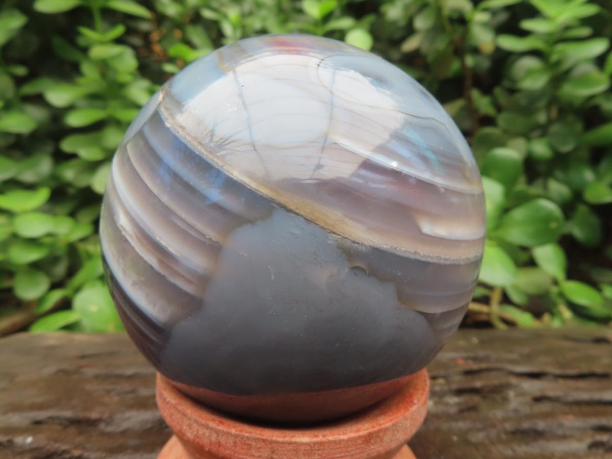 Polished Red, Grey and White Sardonyx Agate Sphere x 1 From Shashe River, Zimbabwe