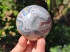 Polished Banded Shashe River Agate Sphere x 1 From Shashe River, Zimbabwe
