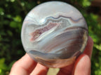 Polished Banded Shashe River Agate Sphere x 1 From Shashe River, Zimbabwe