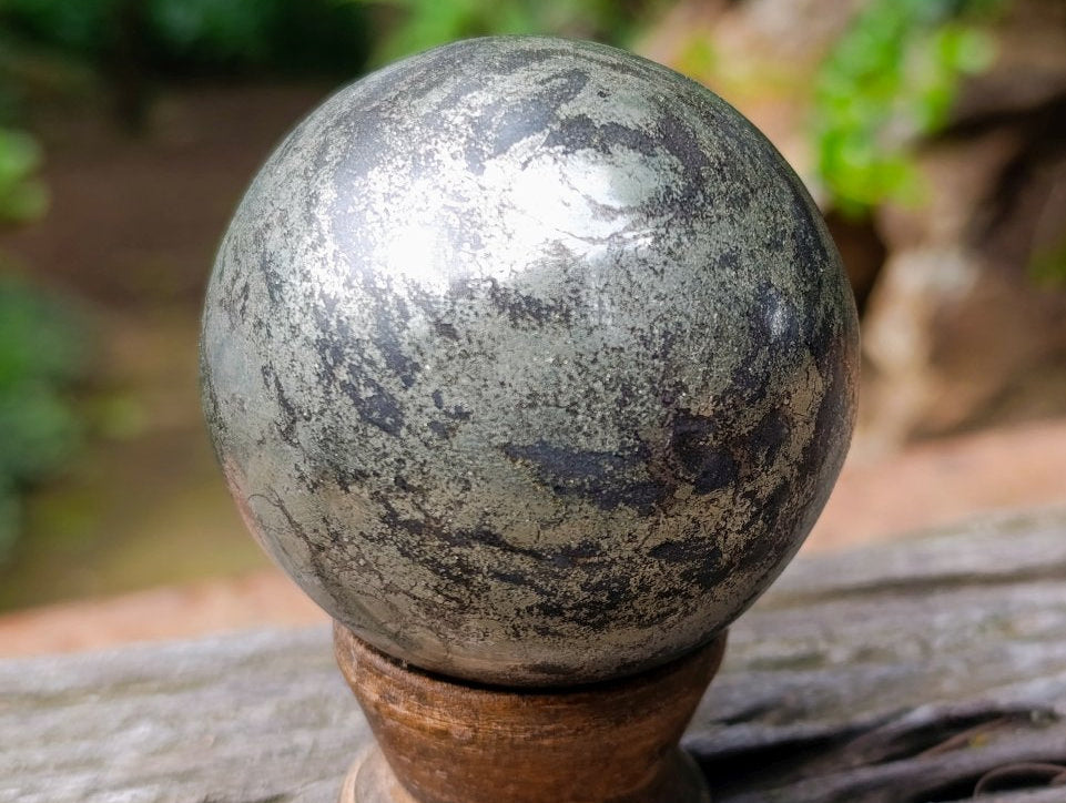 Polished Basalt and Pyrite Pharaoh Stone Sphere with Wooden Stand x 1 From Iron Duke Mine, Zimbabwe