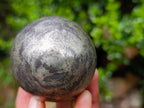 Polished Basalt and Pyrite Pharaoh Stone Sphere with Wooden Stand x 1 From Iron Duke Mine, Zimbabwe
