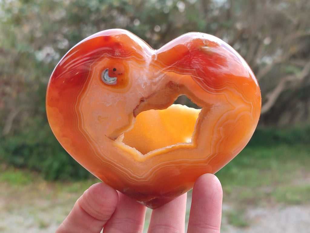 Polished Large Hollow Crystal Centred Carnelian Gemstone Heart x 1 From Lemur Island, Nosy Varika, Madagascar