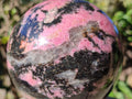 Polished Large Bright Pink and Black Rhodonite Sphere x 1 From Madagascar