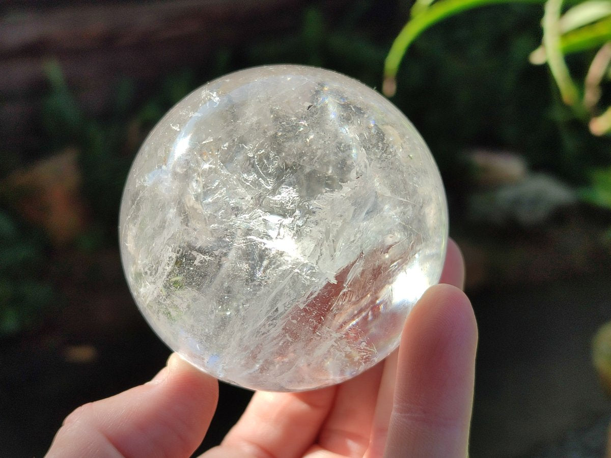 Polished Rainbow Veiled Rock Crystal Ball x 1 From Madagascar