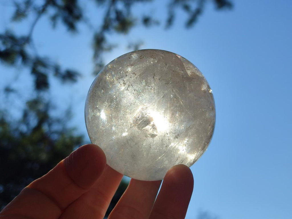 Polished Rainbow Veiled Rock Crystal Ball x 1 From Madagascar