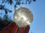 Polished Rainbow Veiled Rock Crystal Ball x 1 From Madagascar