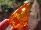 Hand Made Outstandingly Bright Fossil Amber Pendant on an 14 Carat Gold Bezel x 1 From Poland