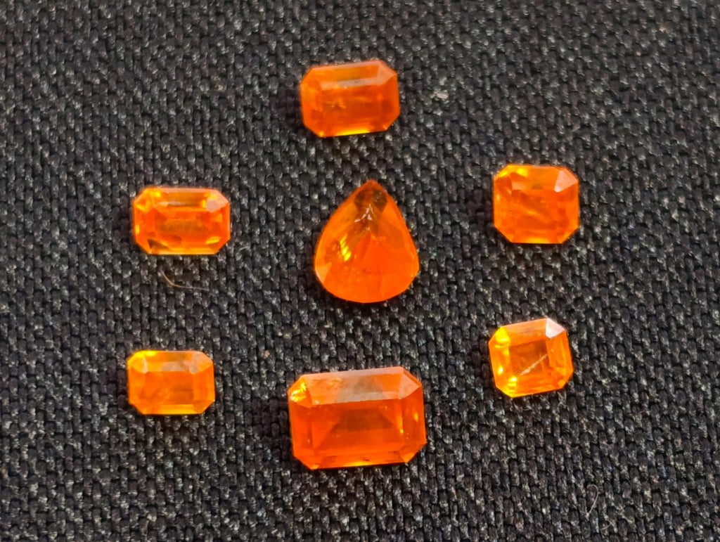 Polished Set of 7 Rare Bright Mandarin Garnet Faceted Stones x 1 From Sperrgebiet, Namibia