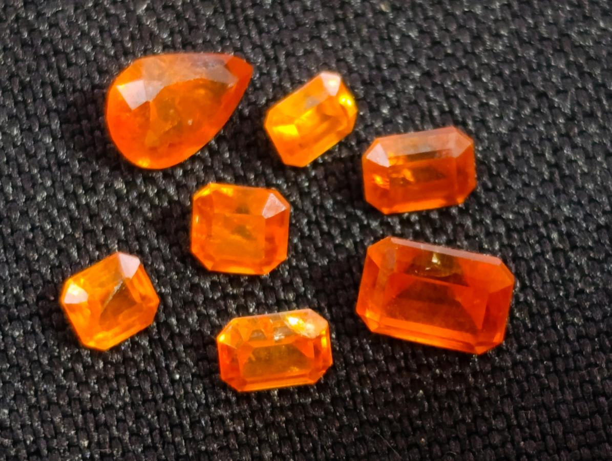 Polished Set of 7 Rare Bright Mandarin Garnet Faceted Stones x 1 From Sperrgebiet, Namibia