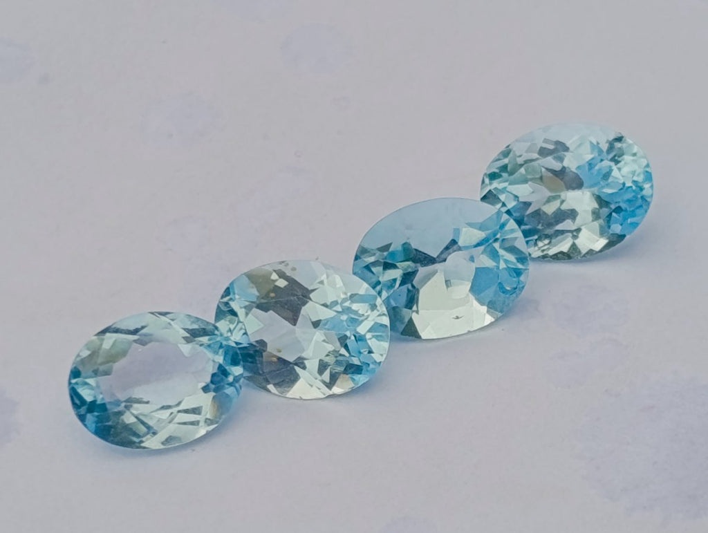 Polished Set of 4 Sky Blue Topaz Faceted Stones x 1 From Switzerland