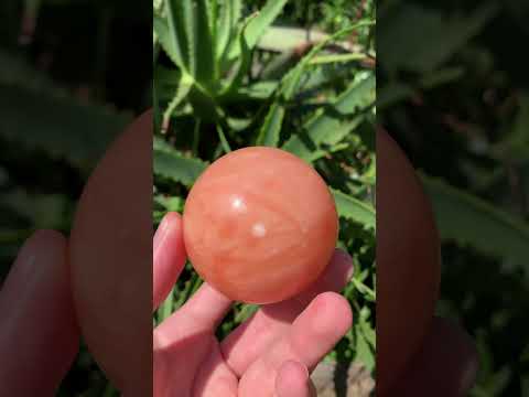 Polished Orange Twist Calcite Sphere x 1 From Madagascar