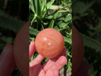 Polished Orange Twist Calcite Sphere x 1 From Madagascar